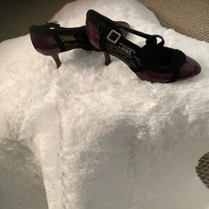 Miss Tina purple and black heels.
